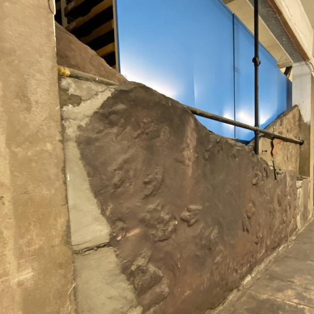 Fossil walls in basement corridors