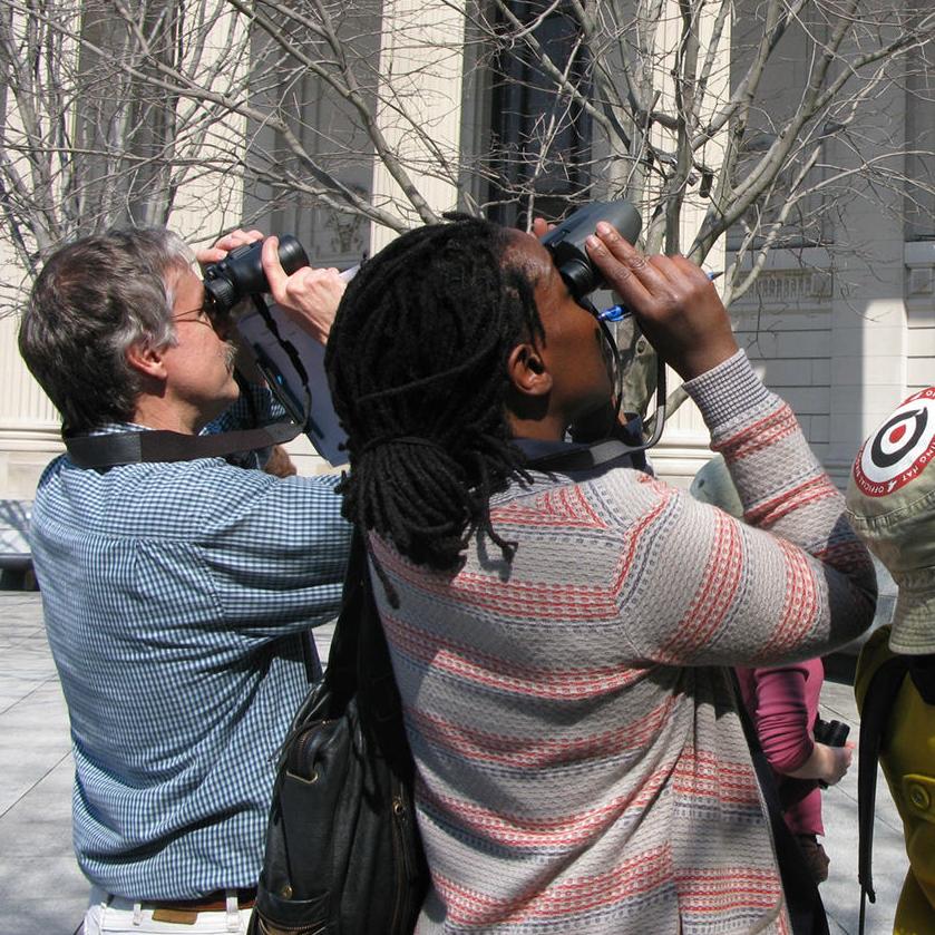Jim Sirch leading a bird watching tour in downtown New Haven