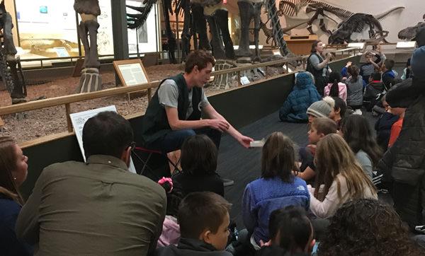 Brian teaching K-12 students in the Great Hall