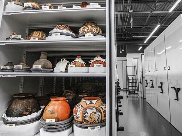 These intact ceramic pots are archeological artifacts of indigenous peoples from the Southwest and modern-day Arkansas. Each is nestled in customized housing. (All photos by Dan Renzetti) 
