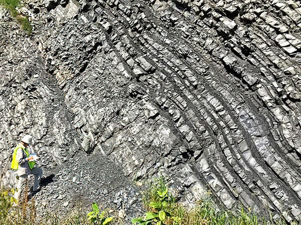 Boriana Kalderon-Asael conducts field work at a Middle-Upper Ordovician outcrop near Reedsville, Penn. (Photo by Ashleigh Hood)