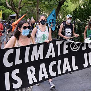 People marching at a climate change rally