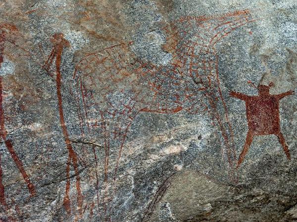 Cave drawings on rock, Tanzania; photo credit: Nina R/Wikimedia Commons