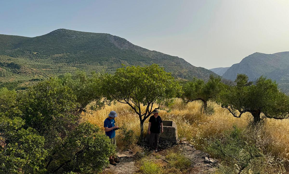Researchers in Greek landscape
