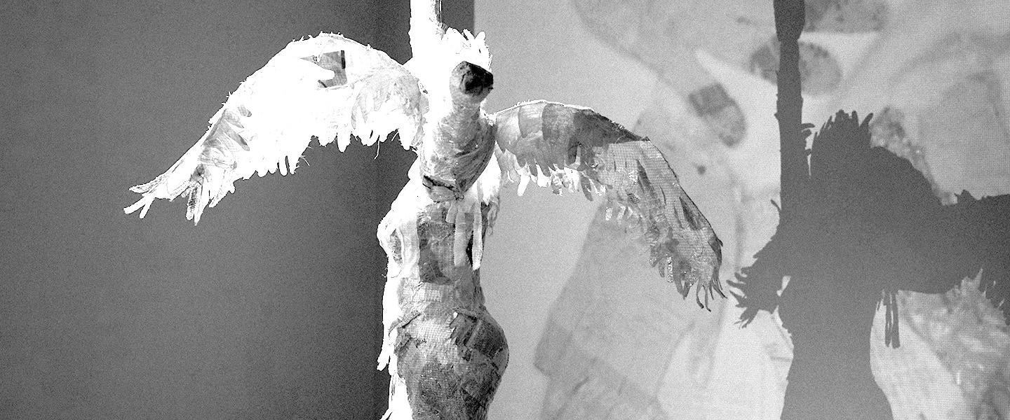 sculpture of woman with bird; art by Kat Wiese